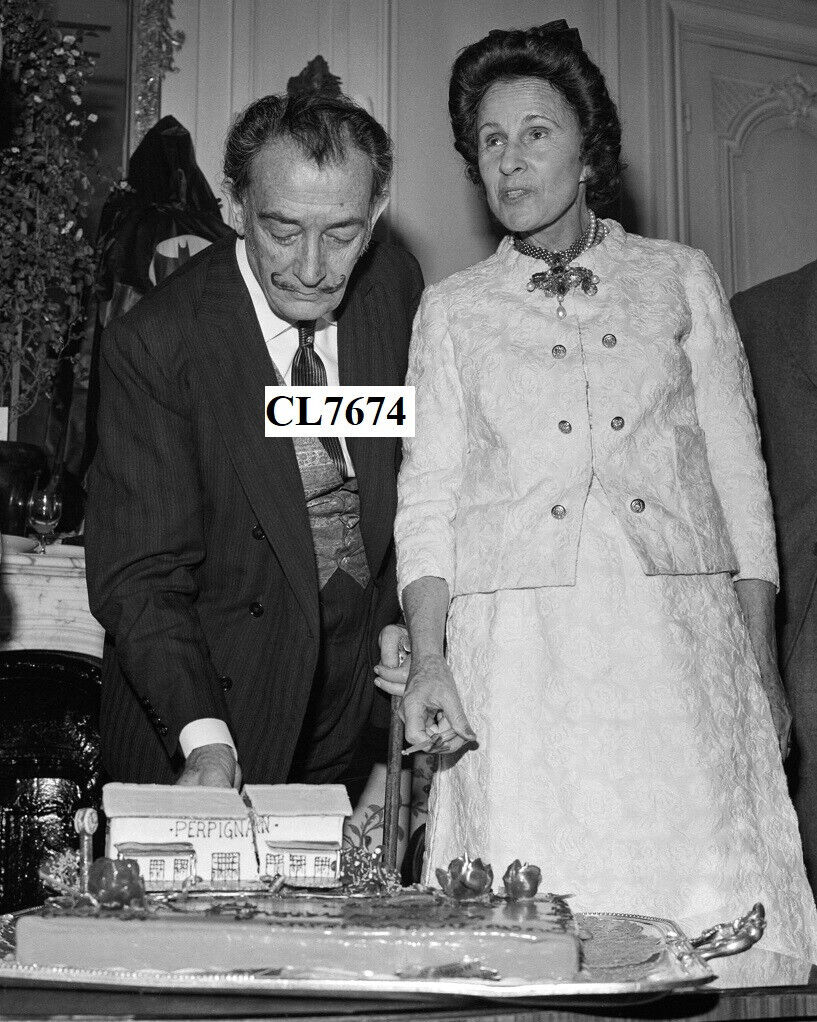 Salvador Dali And Wife Gala Celebrate The Presentation Of His Gold Medal Photo