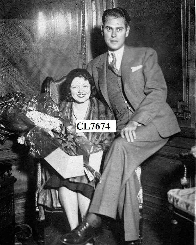 Janet Gaynor Wearing A Fur Coat With Her Husband Lydell Peck Photo